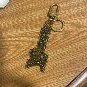 LV Vers Studs Bag Charm & Key Holder authentic Louis Vuitton